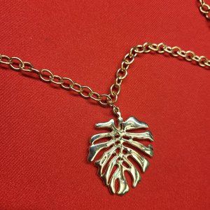 Gold Tone Swiss Cheese Leaf Chain & Pendant Necklace